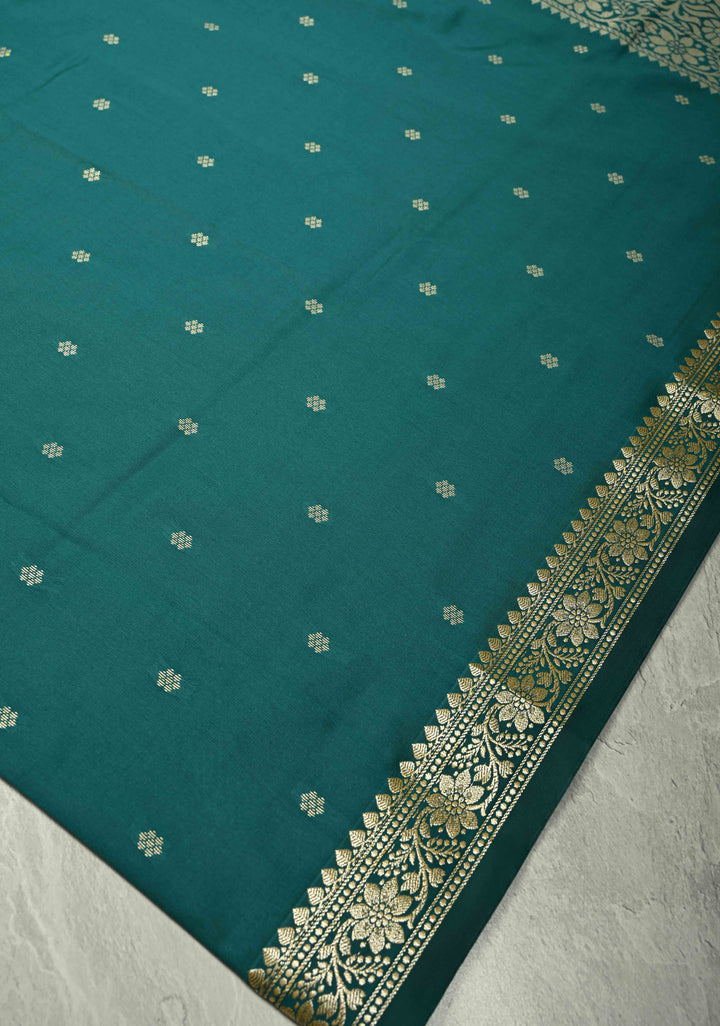 Dark Teal Semi Silk Saree with Chunri Buttis and Minimal Zari Border