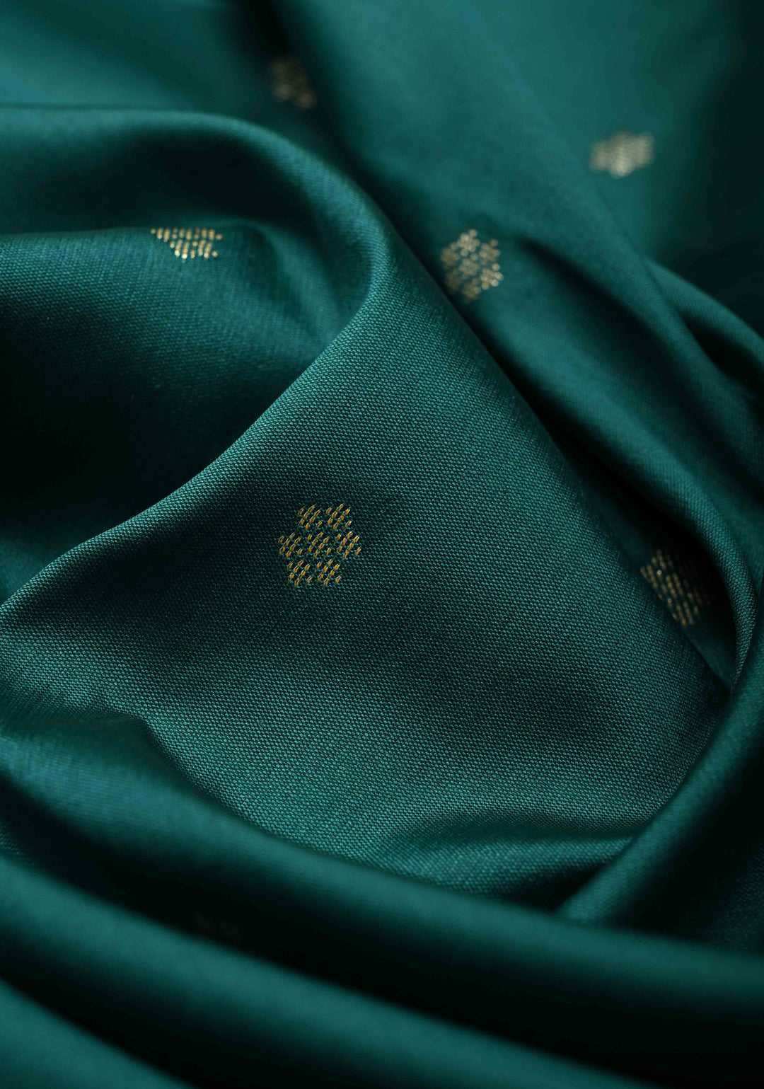 Dark Teal Semi Silk Saree with Chunri Buttis and Minimal Zari Border