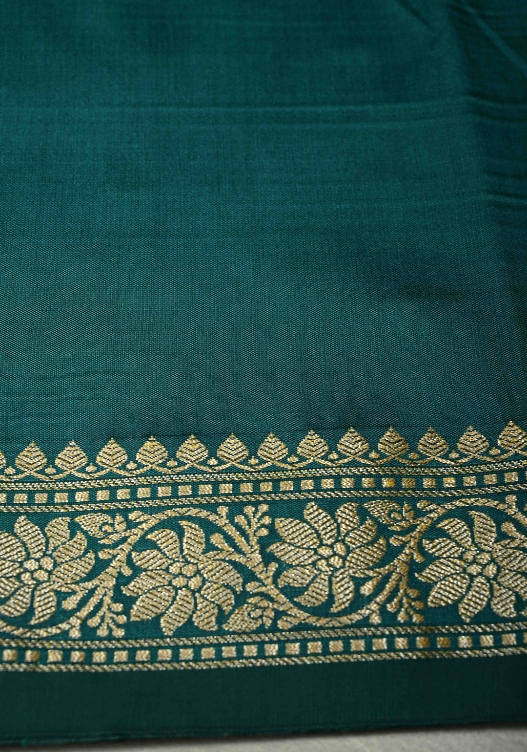 Teal Semi Silk Saree with Chunri Buttis and Minimal Zari Border