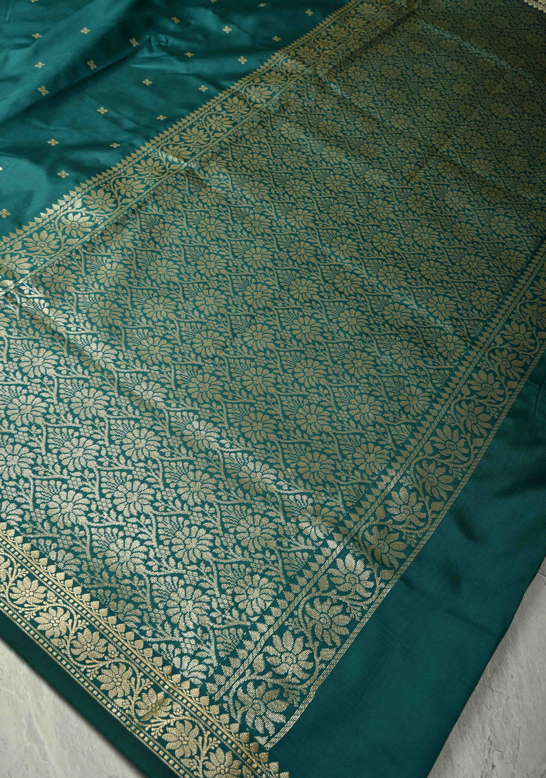 Teal Semi Silk Saree with Chunri Buttis and Minimal Zari Border