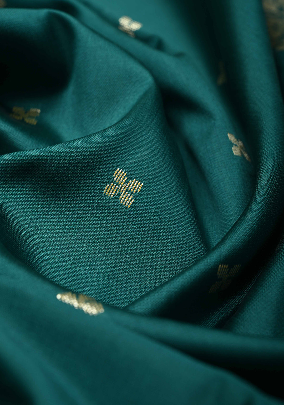 Teal Semi Silk Saree with Chunri Buttis and Minimal Zari Border