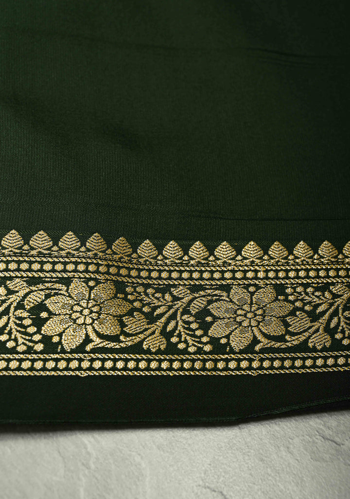 Deep Green Semi Silk Saree with Chunri Buttis and Minimal Zari Border