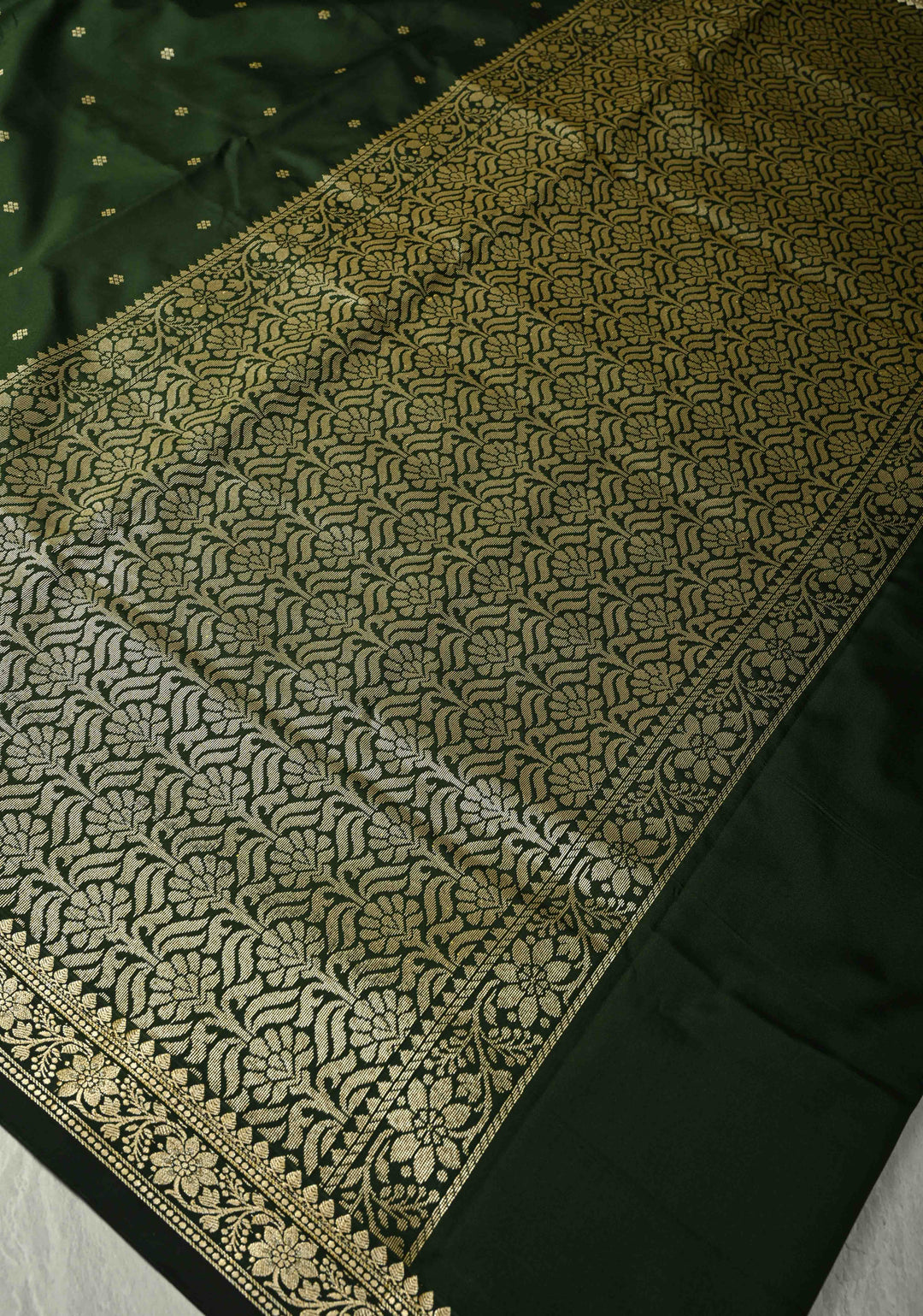Deep Green Semi Silk Saree with Chunri Buttis and Minimal Zari Border