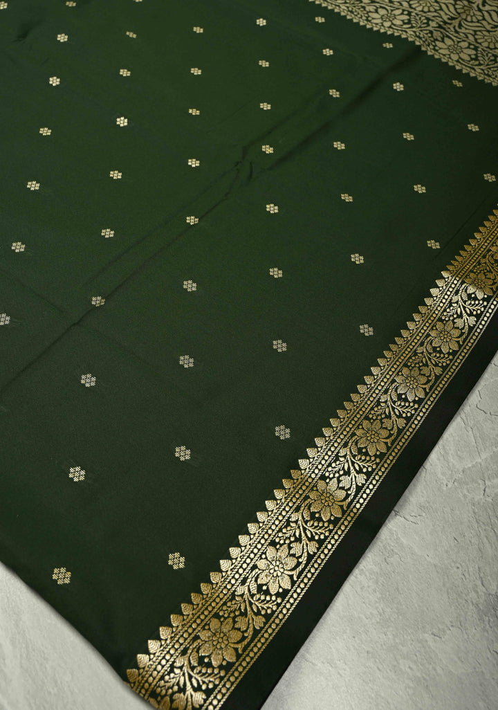 Deep Green Semi Silk Saree with Chunri Buttis and Minimal Zari Border
