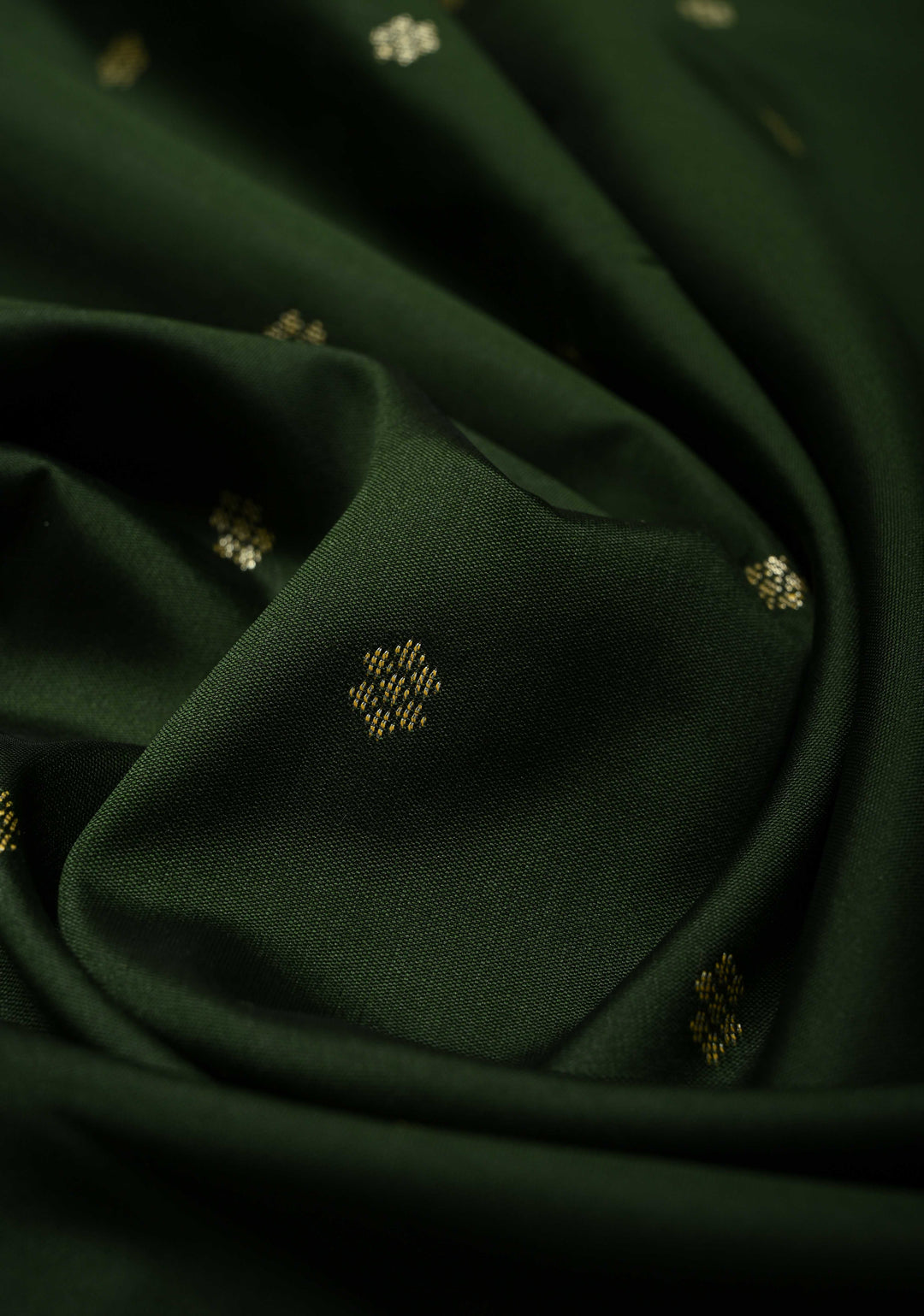 Deep Green Semi Silk Saree with Chunri Buttis and Minimal Zari Border