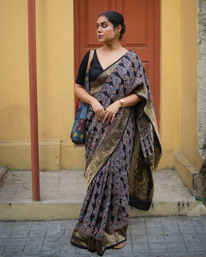 Neelambara Handcrafted Ajrakh Saree on Dola Silk | SHOBITAM