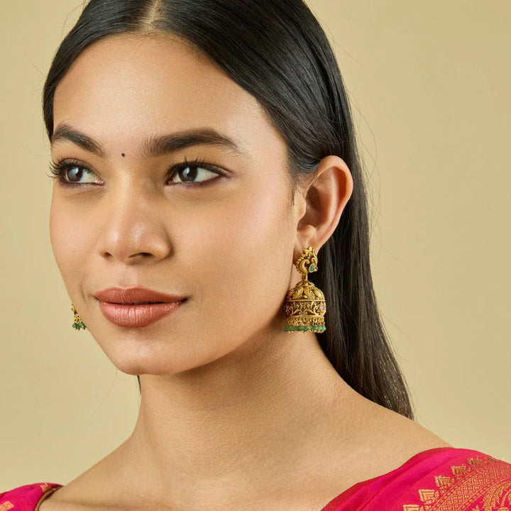 Antique Gold-Plated Peacock Jhumka Earrings with Emerald and Ruby Accents