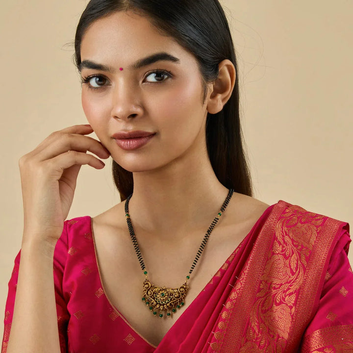 Traditional Gold-Tone Black Bead Mangalsutra with Ornate Gemstone Pendant