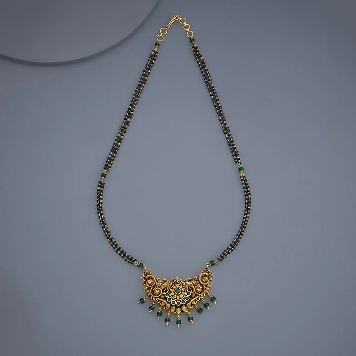 Traditional Gold-Tone Black Bead Mangalsutra with Ornate Gemstone Pendant