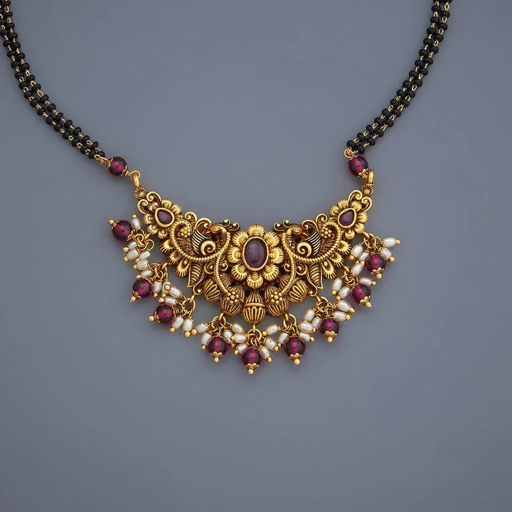 Elegant Gold-Plated Mangalsutra with Gemstone and Pearl Embellishments