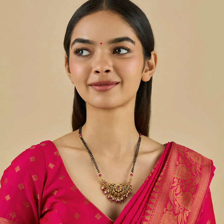 Elegant Gold-Plated Mangalsutra with Gemstone and Pearl Embellishments