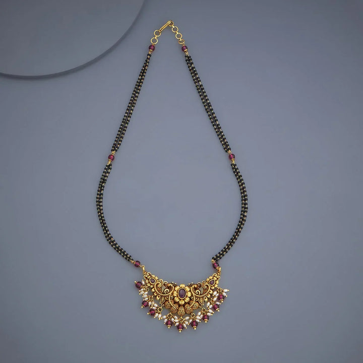 Elegant Gold-Plated Mangalsutra with Gemstone and Pearl Embellishments