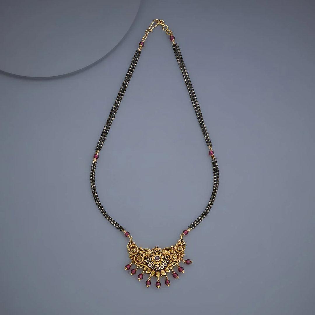 Traditional Gold-Tone Black Bead Mangalsutra with Ornate Gemstone Pendant