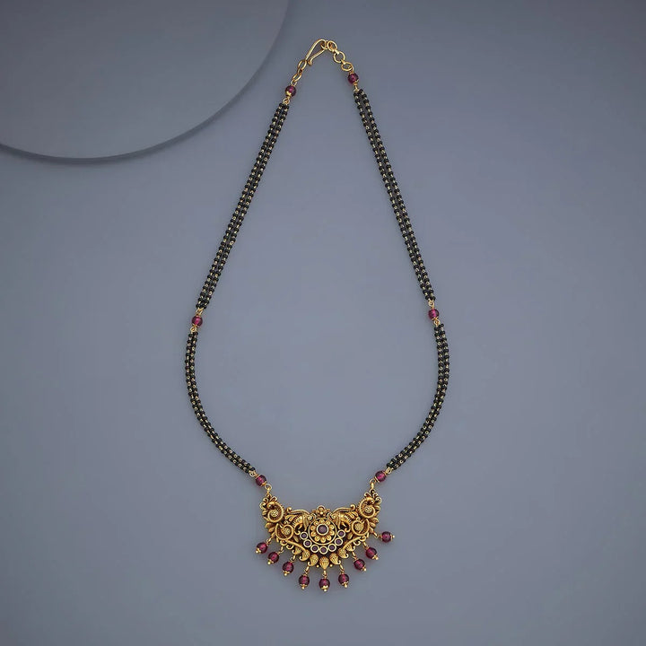 Traditional Gold-Tone Black Bead Mangalsutra with Ornate Gemstone Pendant