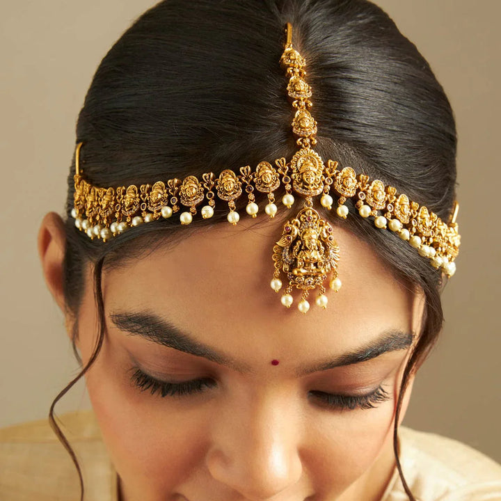 Lakshmi Penmdant and Motif Antique Tikka with dangling pearls