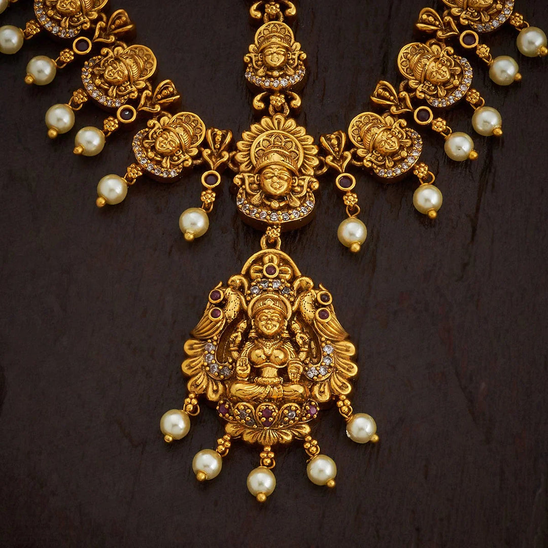 Lakshmi Penmdant and Motif Antique Tikka with dangling pearls