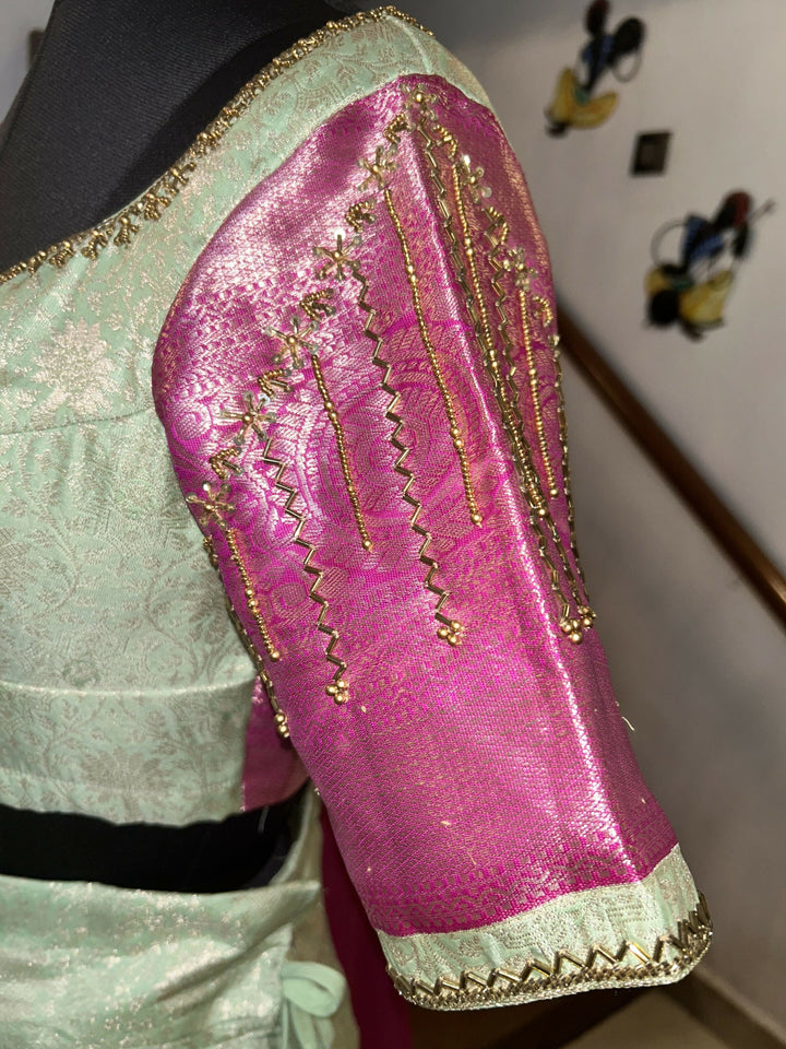 Yuvathi Mint green silk half Saree lehenga set with aari work