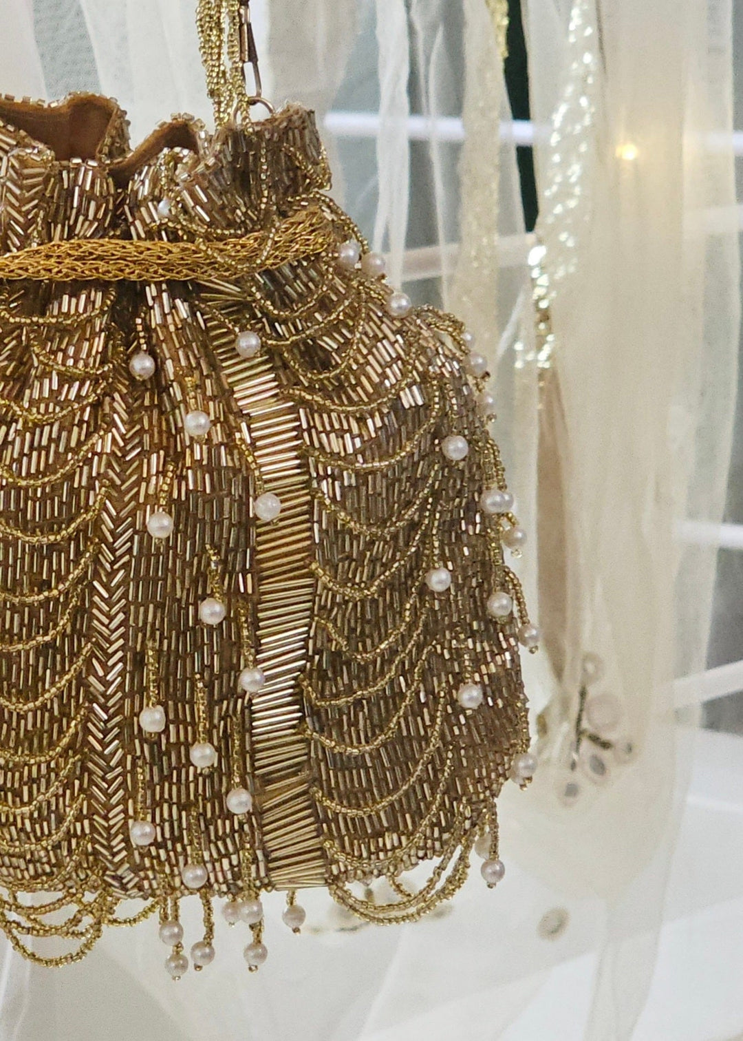 Heera Golden Embroidered Potli