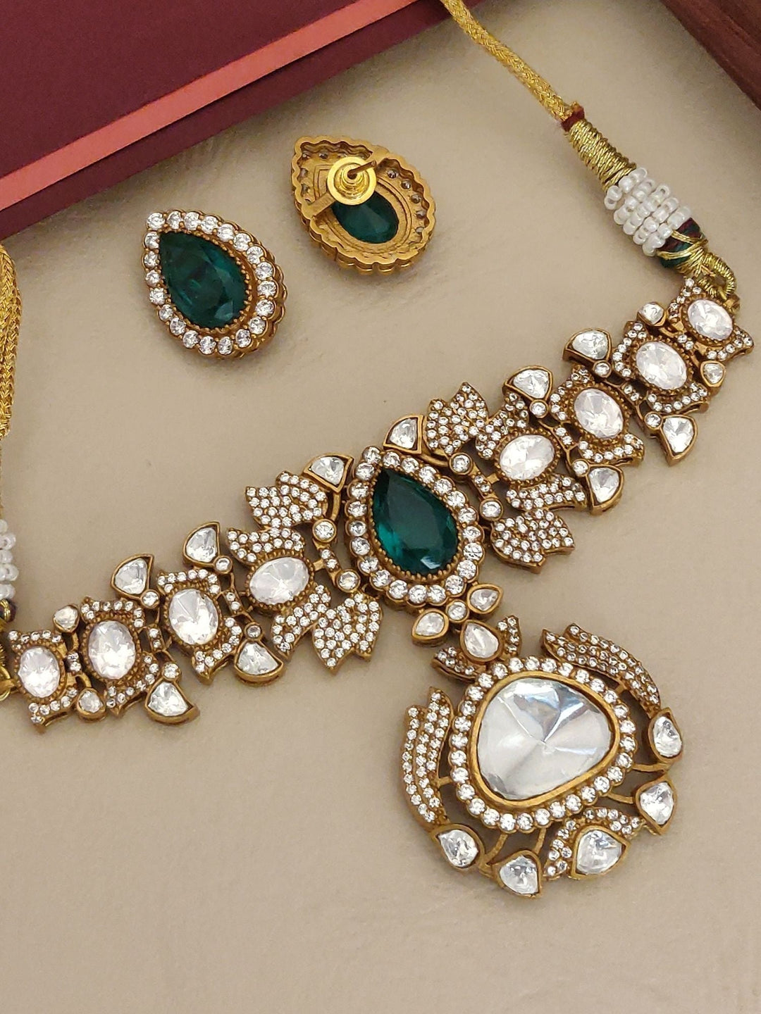 Green Emerald Stone Ethnic Elegant Festive Polki Choker Set | SHOBITAM
