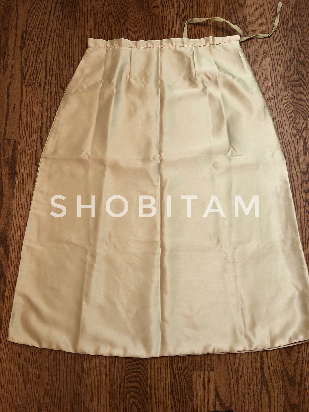 Premium Quality Muted Gold Satin Petticoat for saree, in standard size.