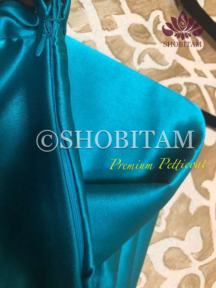 Premium Quality teal green Satin Petticoat for saree, in standard size. | SHOBITAM