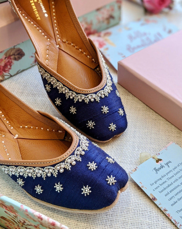 ALIZEH : Pastels and Pop X Anushree Reddy Navy Blue and Silver Embroidered Punjabi Juttis