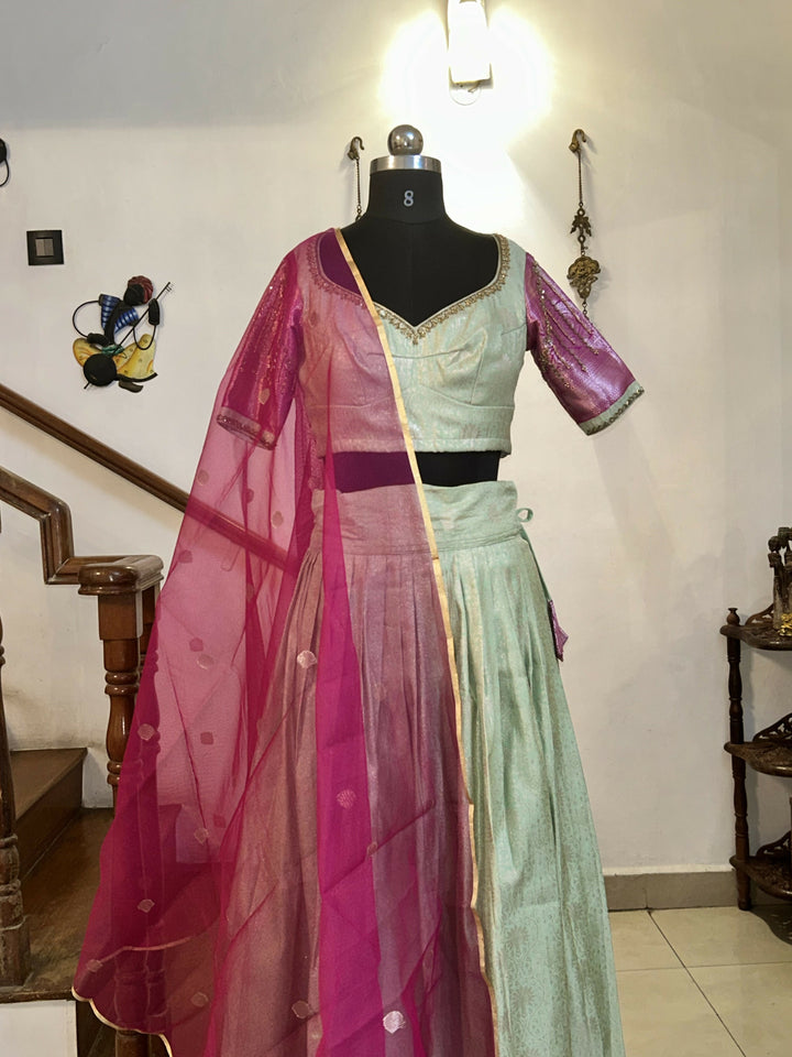 Yuvathi Mint green silk half Saree lehenga set with aari work