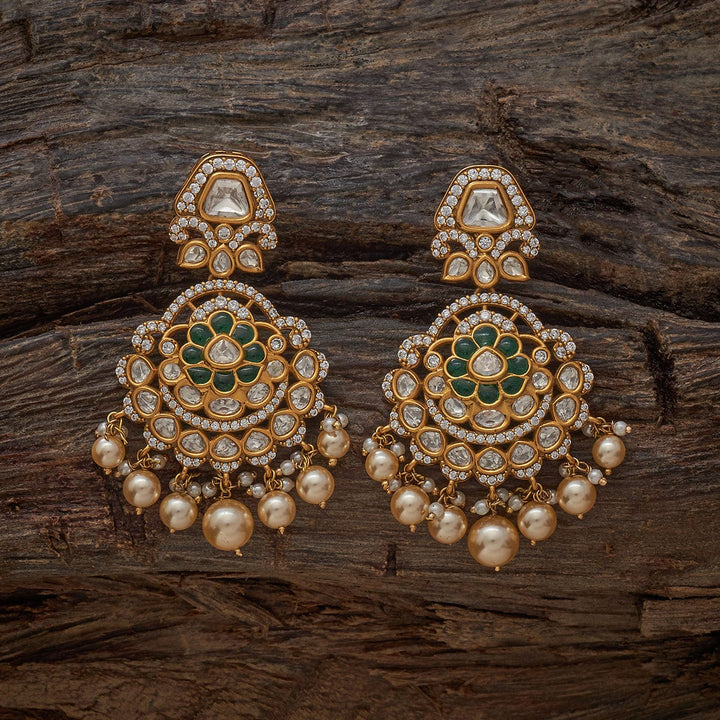 Kundan Floral Motif Polki Earrings with Green Gems and Pearl Details
