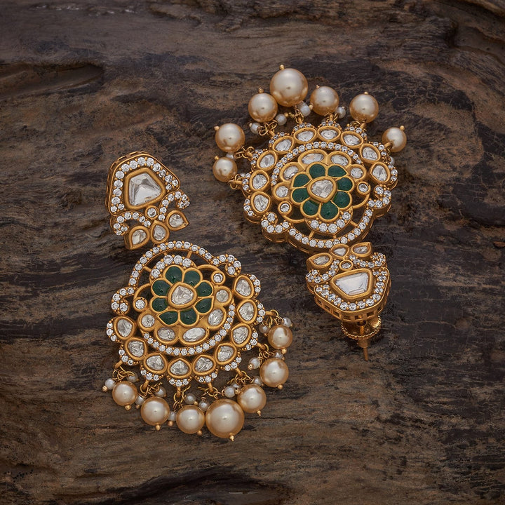 Kundan Floral Motif Polki Earrings with Green Gems and Pearl Details