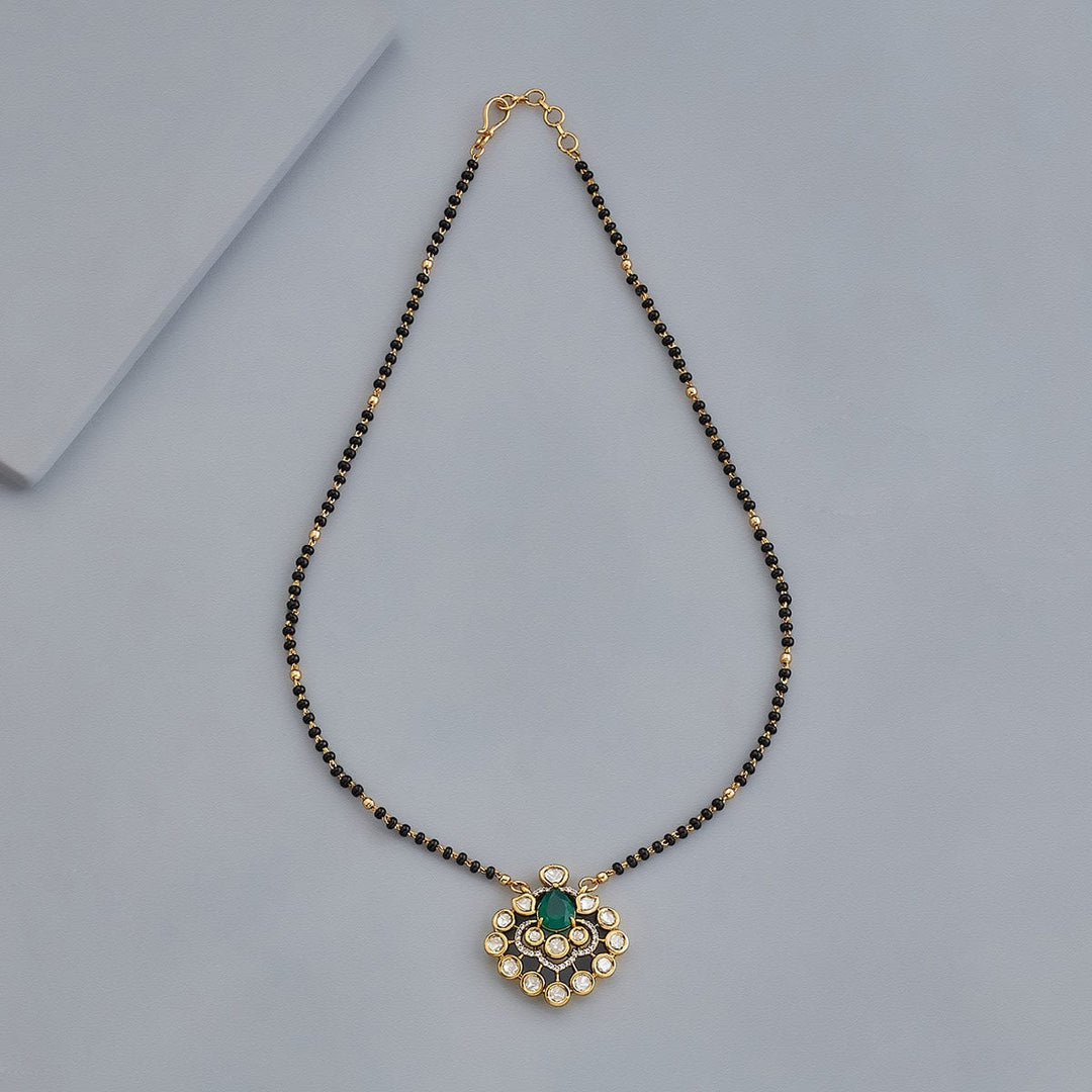 Stylish Mangalsutra Featuring Kundan Stones and Central Green Bead