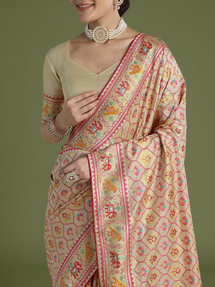 Cream Semi Banarasi Satin Silk Saree With Patola Work | SHOBITAM