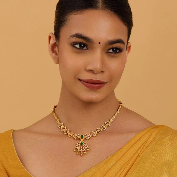 Pure 92.5 Silver Gold-Plated Floral Design Necklace with White Stones and Dangling Gold Beads
