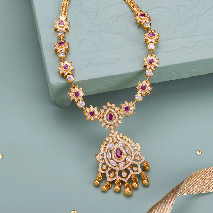 Pure 92.5 Silver, Gold Plated Floral Motif Temple Necklace with Pear-Cut Emerald Pendant with Gold Dangling Beads