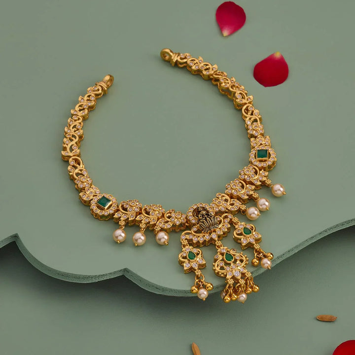 Pure 92.5 Silver, Gold Plated Green-White Stone Temple Necklace with Deity Motif and Pearls Drops