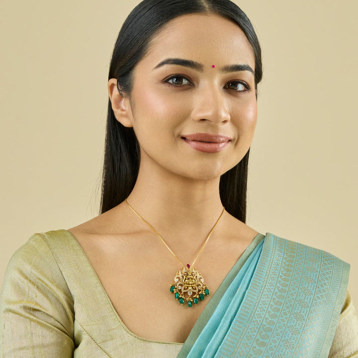 Pure 92.5 Silver Lakshmi Lotus Pendant in Gold Finish with White Stone Embellishments and Green Dangling