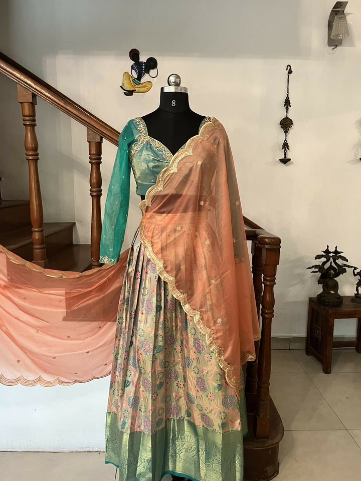 Yuvathi Tissue Pastel Peach half saree/lehenga set