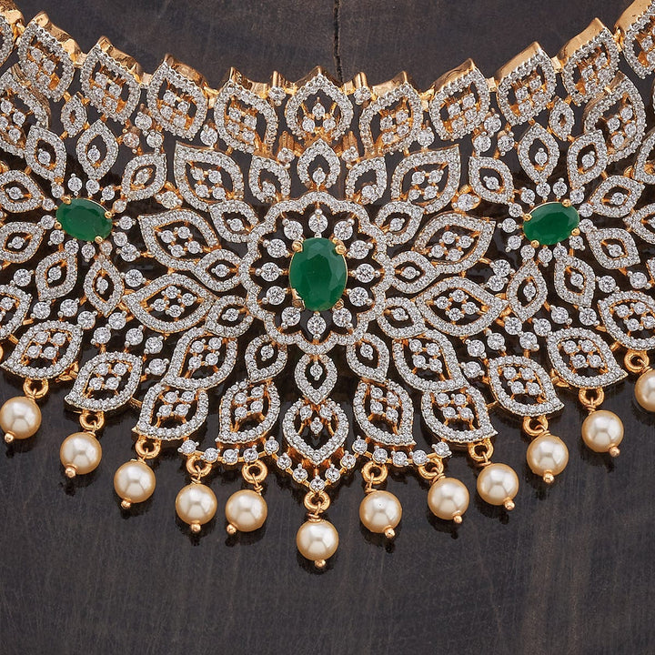 Beautiful Cubic Zirconia Stone-Studded Floral Design Necklace Set with Green stone and Drops Pearls