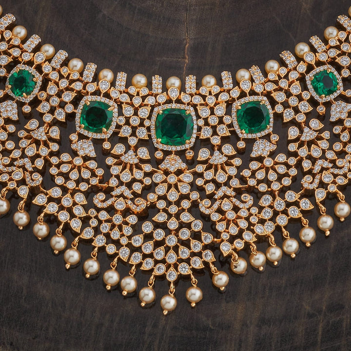 Gold Plated Cubic Zirconia Stone-Studded Necklace Set with Green stone and Dangling Pearls