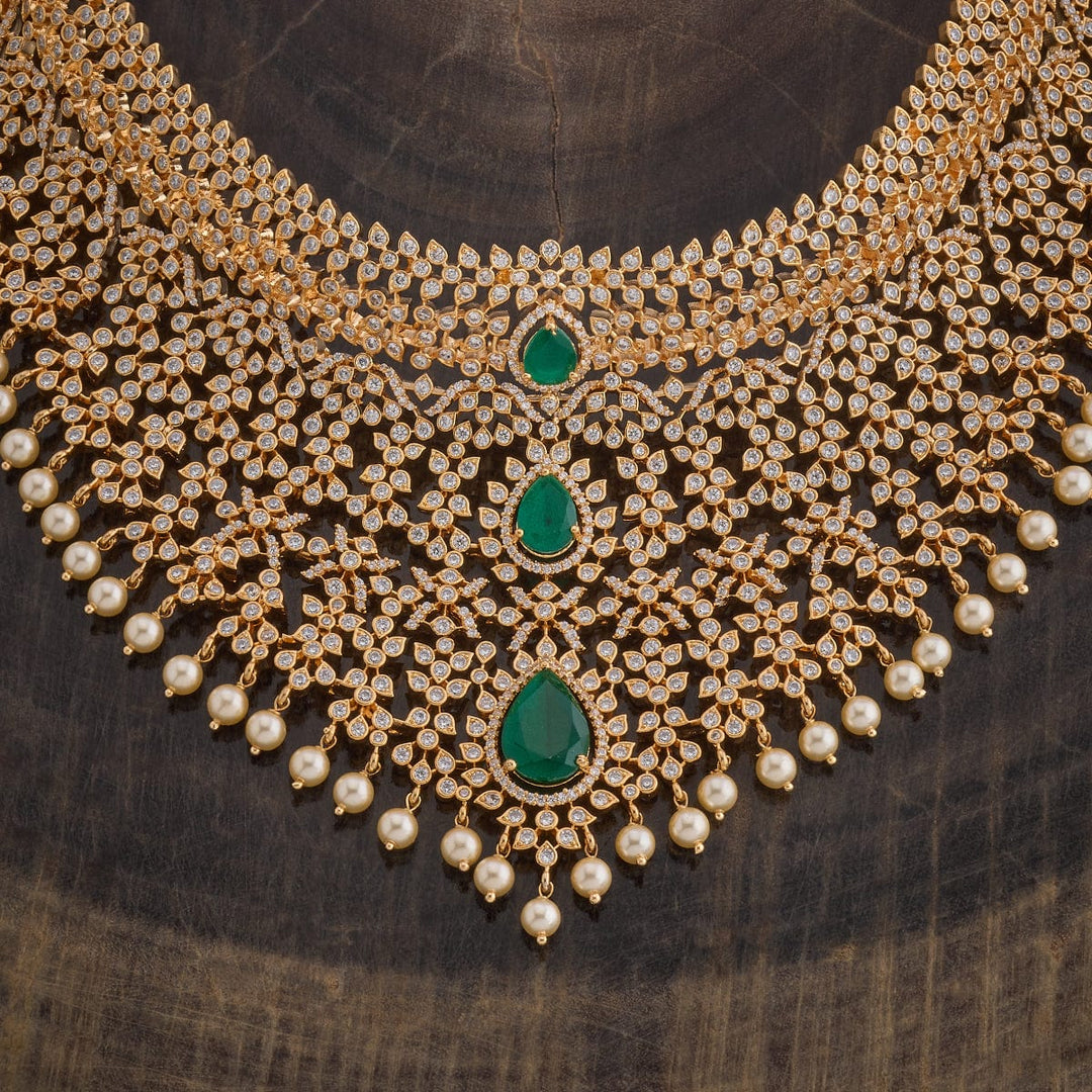 Gold Plated Cubic Zirconia Stone-Studded Floral Necklace Set with Green stone and Dangling Pearls