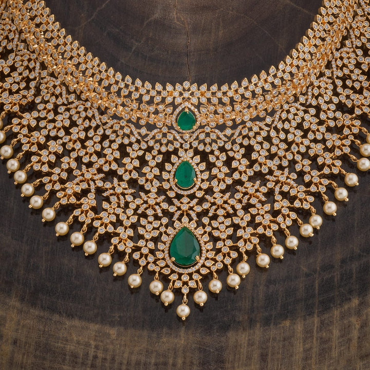 Gold Plated Cubic Zirconia Stone-Studded Floral Necklace Set with Green stone and Dangling Pearls