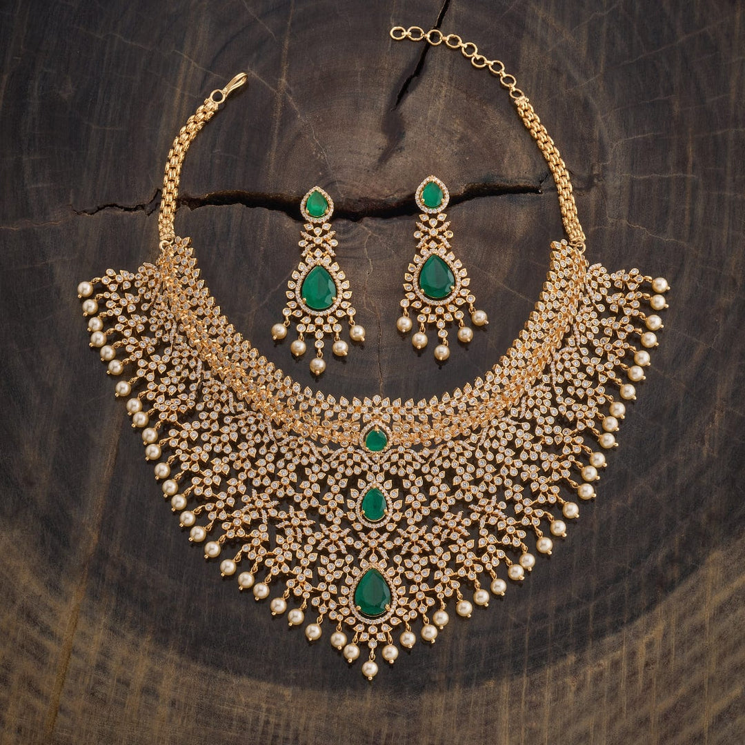 Gold Plated Cubic Zirconia Stone-Studded Floral Necklace Set with Green stone and Dangling Pearls