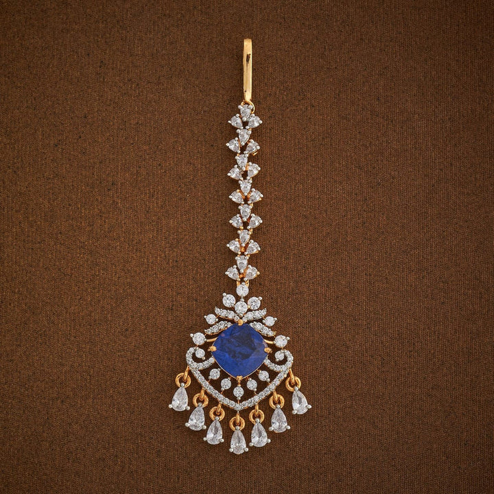 Handcrafted Maang Tikka embellished with synthetic stones in White and Sapphire