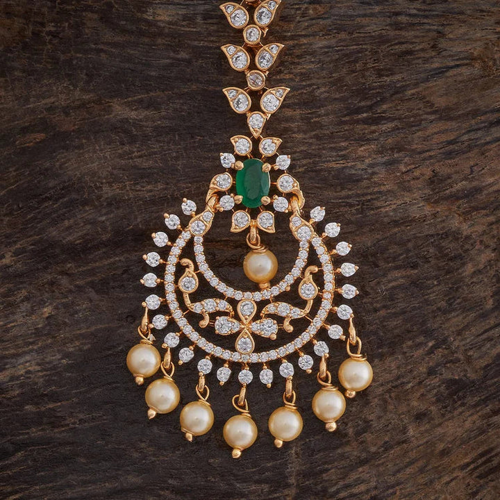 Flower Motif Handcrafted gold-polished Tikka embellished with synthetic stones and beads in Green